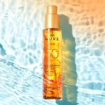 L'Huile Solaire Bronzante SPF10, SPF30 et SPF50 ainsi que le Spray Solaire Délicieux SPF30 et SP50 de Nuxe ont été relancés dans un nouveau packaging équipé de la pompe PZ Twist d'Aptar au début de l'année en Europe, Asie et Amérique Latine.